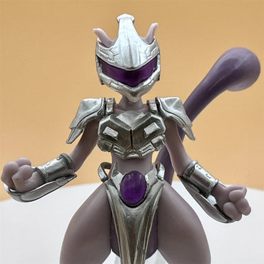 Toy figure with metallic silver and purple accents on a beige background